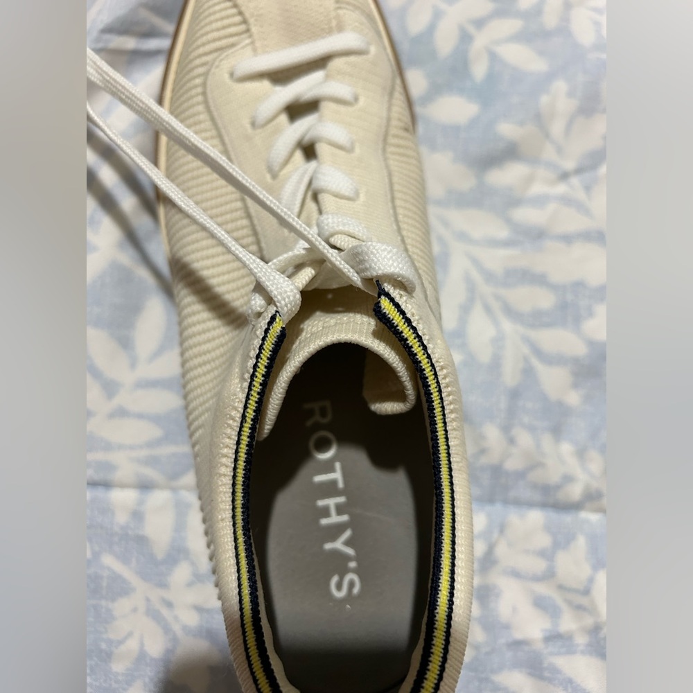 Rothy's Ivory Sneakers with Yellow and Black Accents